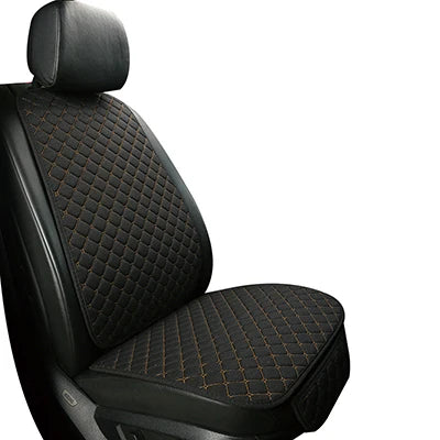 Linen car seat cover black gold stitching single front seat close-up angle
