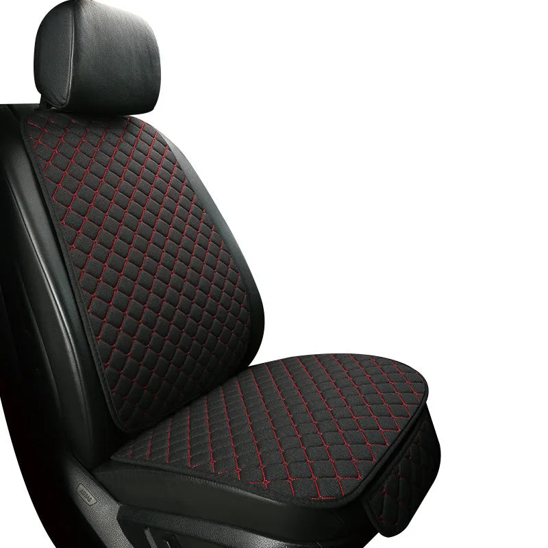 Linen car seat cover black with red stitching single front seat close-up view