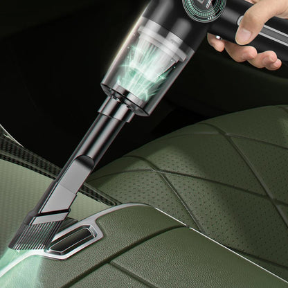 Cordless vacuum cleaner in use cleaning car interior – seats and vents