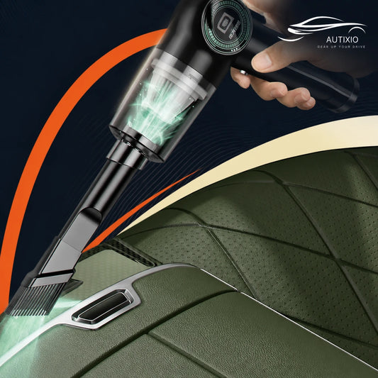 Cordless vacuum cleaner in use cleaning car interior – seats and vents