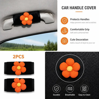 Plush car handle cover with orange flower decoration pair installed on interior handle
