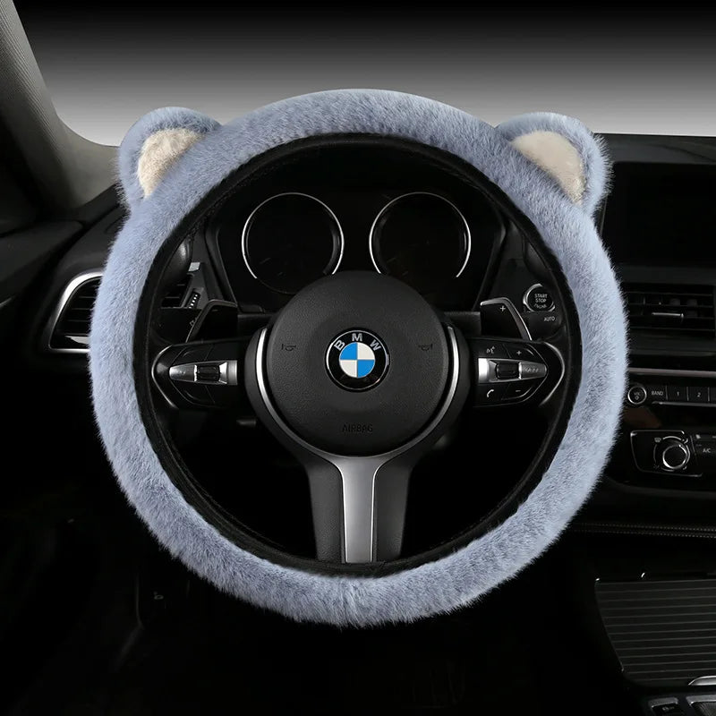 Plush cat ear steering wheel cover solid blue grey installed on BMW steering wheel