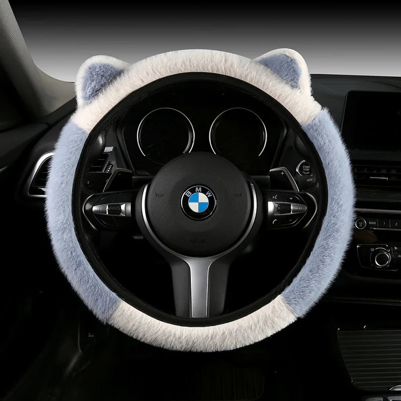 Plush cat ear steering wheel cover blue and white installed on BMW steering wheel