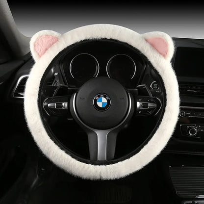 Plush cat ear steering wheel cover white with pink-lined cat ears installed on BMW steering wheel