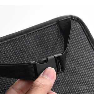 Hand clicking buckle strap on car seat back organizer for easy headrest installation