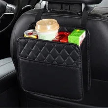 PU leather car seat back organizer mounted on headrest with snacks stored inside – angled view