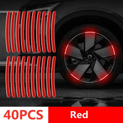 40PCS red reflective wheel rim tape strips with diamond pattern showing bright red night glow on car alloy wheel