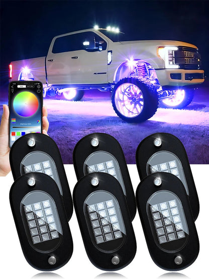 6 RGB underglow pods with Bluetooth app showing purple underglow on lifted truck