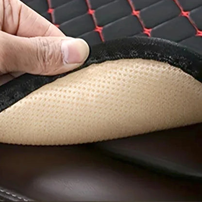 Close-up of padded seat cushion material – black breathable mesh and stitching
