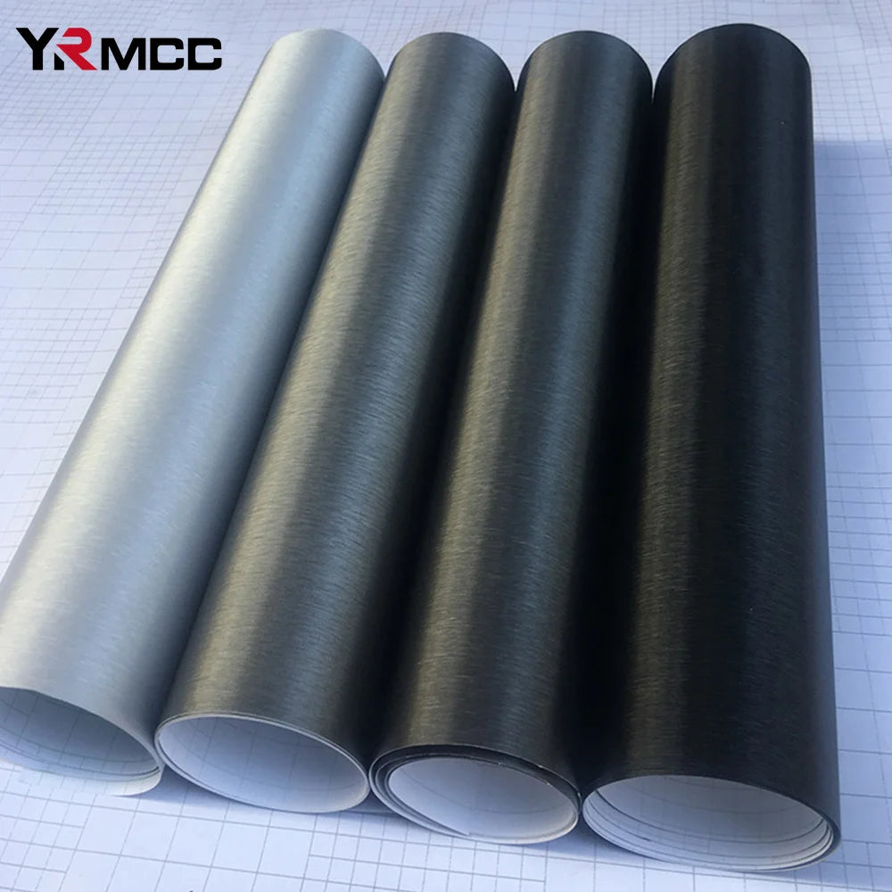 Brushed aluminum vinyl wrap rolls in all four colors silver grey deep grey and black on grid background
