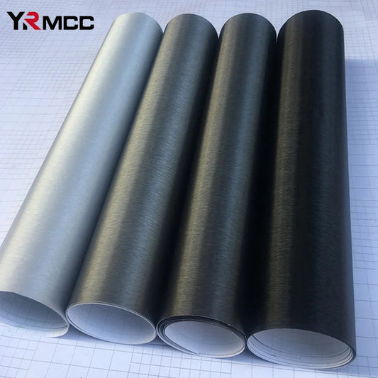 Brushed aluminum vinyl wrap rolls in all four colors silver grey deep grey and black on grid background