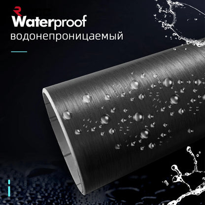 Black brushed aluminum vinyl wrap roll with water droplets demonstrating waterproof surface