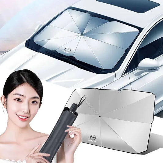 Silver foldable windshield sunshade installed on car with product shown in folded and expanded form