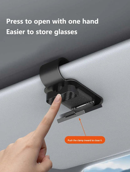 Black sun visor glasses clip installed on car sun visor with one-hand press to open