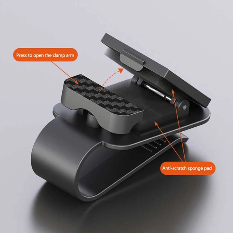 Sun visor glasses clip open showing press-to-open arm and anti-scratch sponge pad
