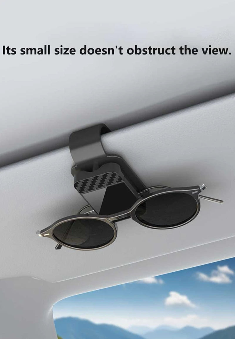 Sun visor glasses clip holding sunglasses on car visor without obstructing driver view