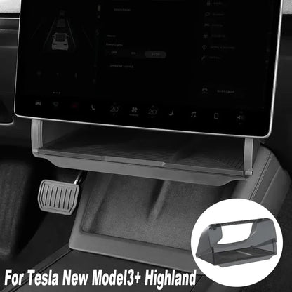 Tesla Model Y center console organizer installed below touchscreen with storage items displayed
