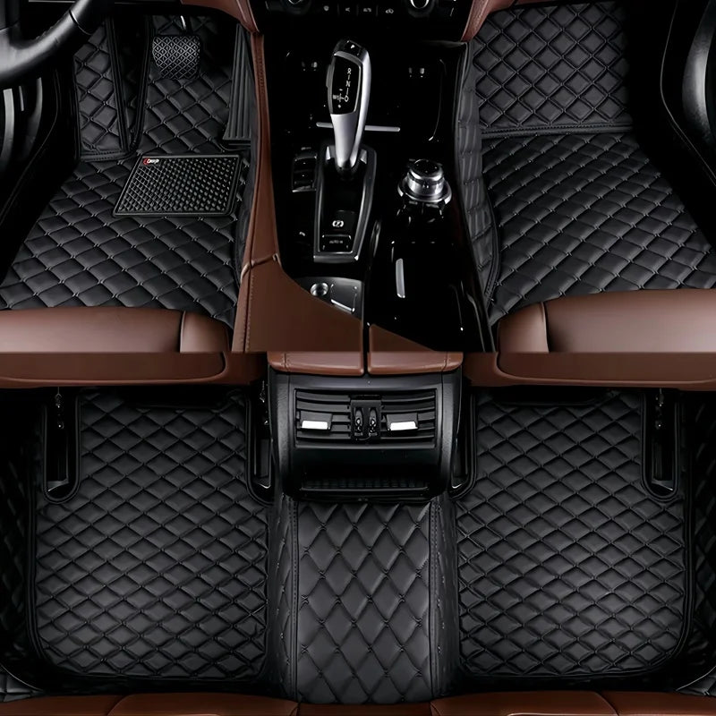 Toyota Corolla Cross Hybrid floor mats in all-black – premium black diamond-quilt leather, full front and rear cabin coverage