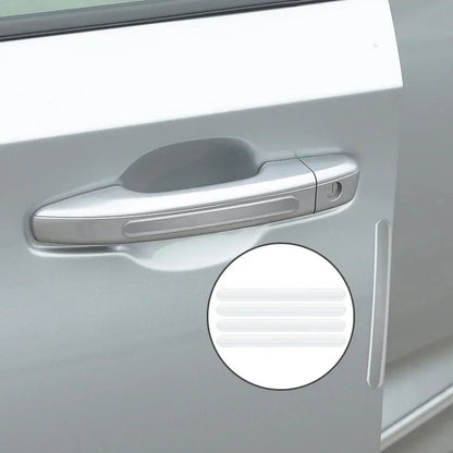 Clear transparent silicone scratch guards applied to silver car door handle with 4-piece inset