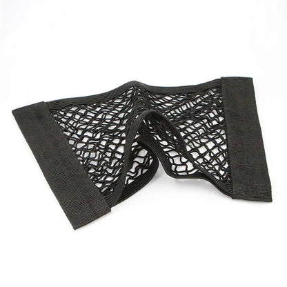 Trunk cargo net velcro mesh pocket folded showing elastic mesh texture detail