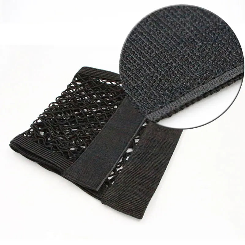 Close-up of trunk cargo net showing velcro backing texture with magnified inset