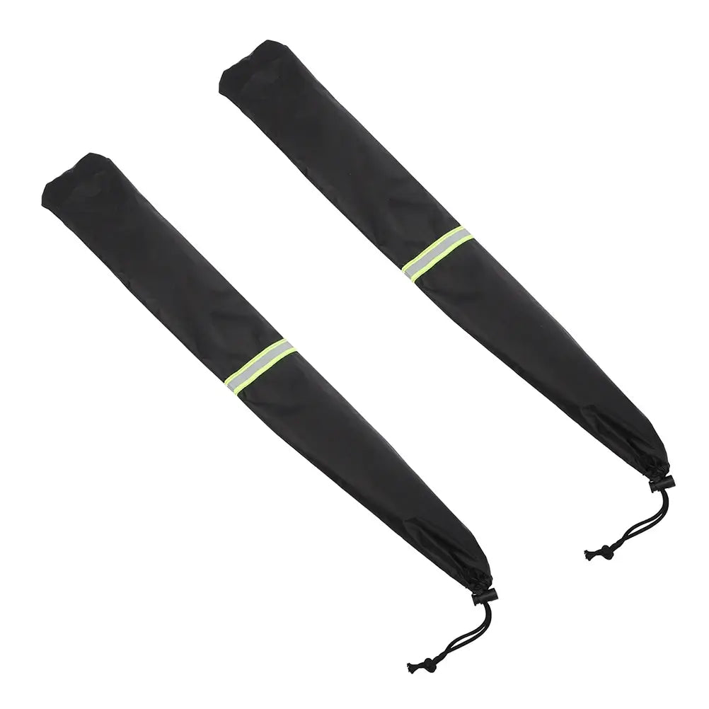 Pair of black windshield wiper covers with reflective neon yellow safety strip and drawstring closure on white background