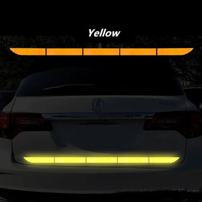 Yellow reflective rear bumper strip for improved car visibility and safety during nighttime driving